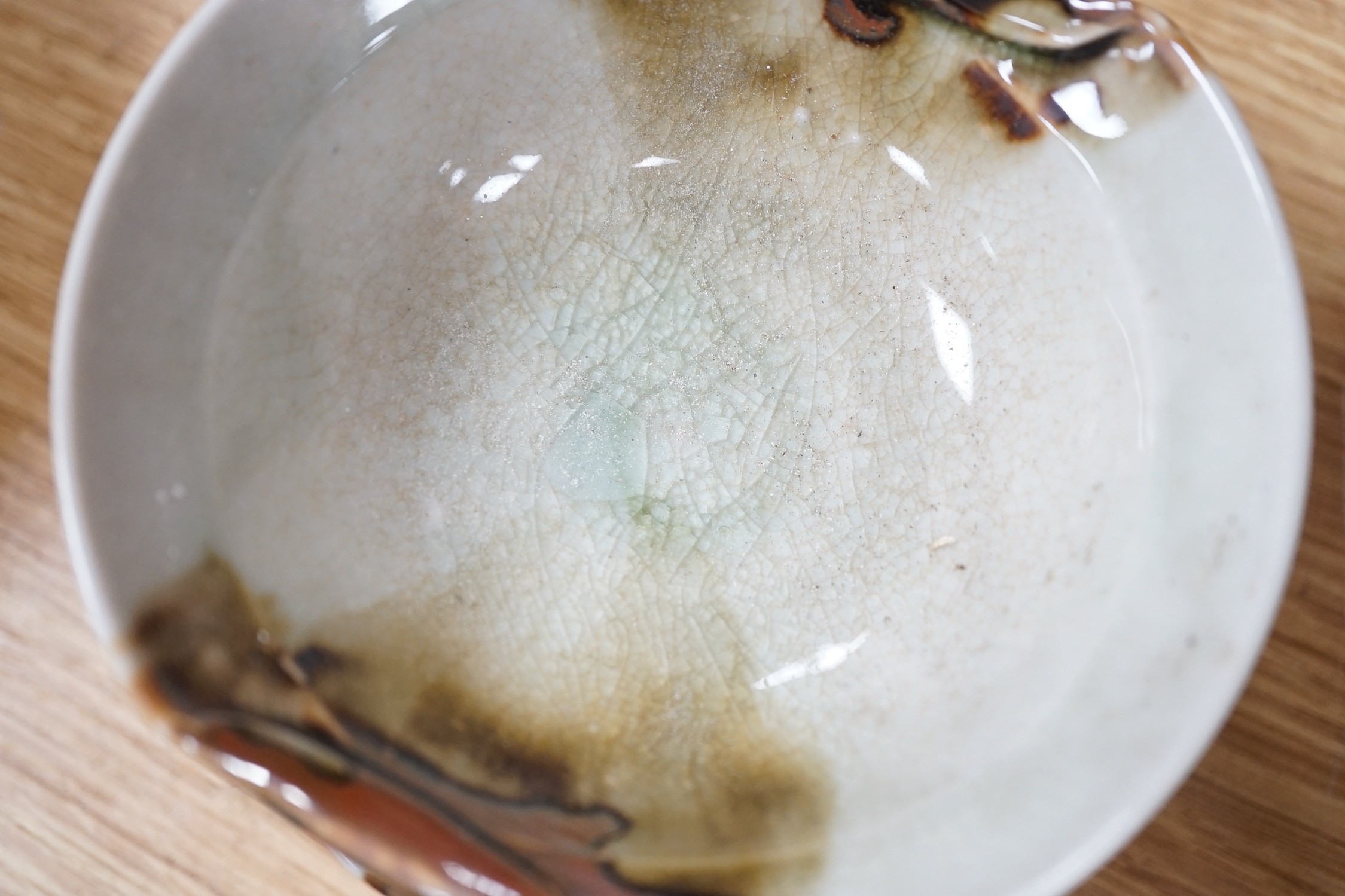 A group of Japanese studio pottery bowls, shell dishes, plates and a teapot, approx 53 pieces